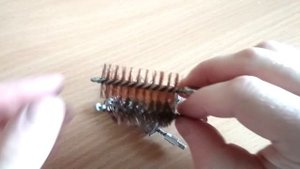 Чистка газовой камеры в огнестрельном оружии.