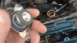 Замена крышки радиатора