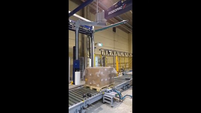 Обмотка паллеты стрейч-плёнкой. Паллетообмотчик Robopac с вращающейся рукой.