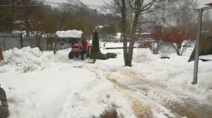 минитрактор kubota  уборка снега