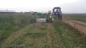Беларус с прицепной косилкой KDC-301W