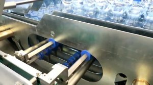 Групповая упаковка ПЭТ бутылок на PRASMATIC TC