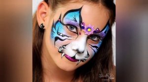 Drawings on the face. face painting,.how to paint a face for the holiday