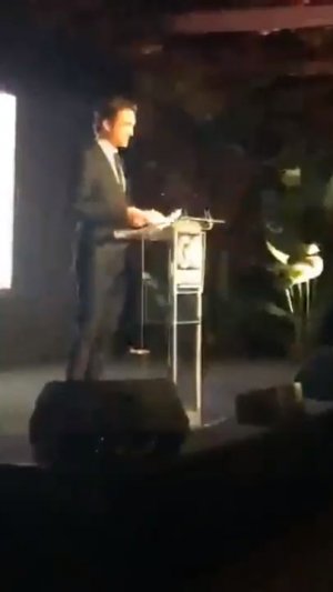 Robert Pattinson giving speech on stage GOCampaign GOGala