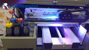 печать уф принтера А3 формата на зажигалках.mp4