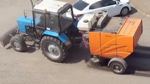 Трактор МТЗ-82.1 и прицепной пылесос
