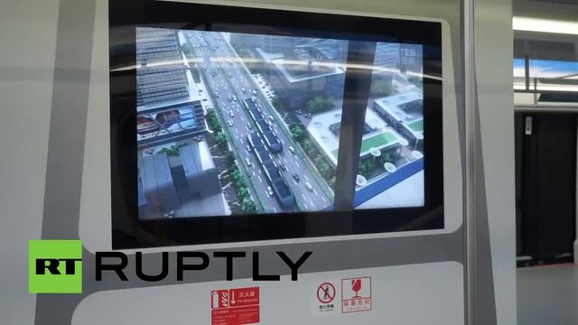 Портальный автобус в Китае, транспорт будущего смотреть онлайн