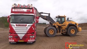 Volvo L220H Wheelloader Loading Scania V8 and Volvo 8x4 Trucks