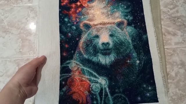 Рулон вышитых работ.