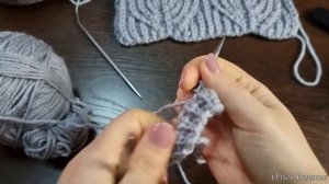 Стильный жилет спицами с красивым узором и воротом