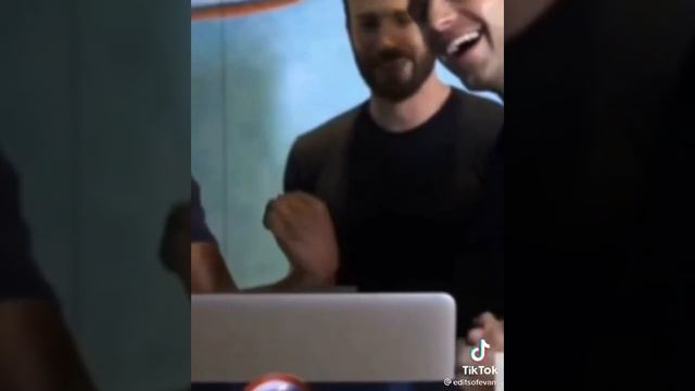 Chris Evans showing his Bicep to Anthony Mackie..