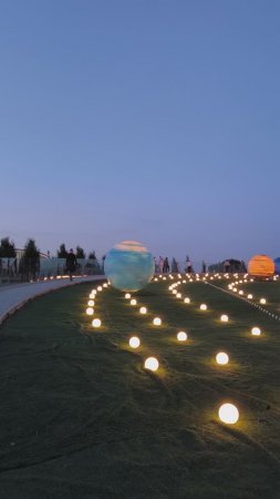 Арт-объект Солнечная система в парке Галицкого на закате Краснодар весна конец мая