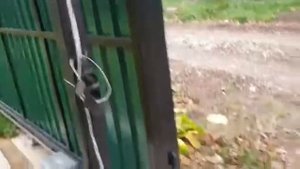 Откатные ворота с автоматикой и забор из профлиста в секциях