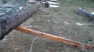 закатываение бревна 6 метров на пилораму