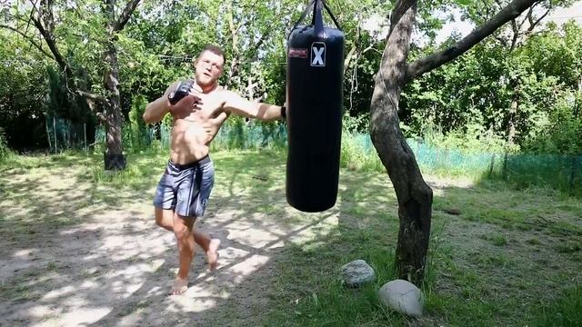 Working on a Universal boxing bag 40 kg - Nikolay Aleksakhin смотреть онлайн