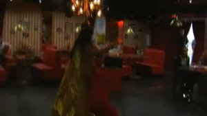 Восточный танец с канделябром и крыльями