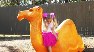 Funny Baby Diana and Roma playing at the zoo and feed animals Video for kids