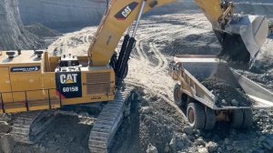 Caterpillar 6015B Excavator Loading Caterpillar Dumpers - Sotiriadis Mining Works