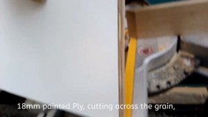 Dewalt DWS773 miter saw cutting Plywood across the grain