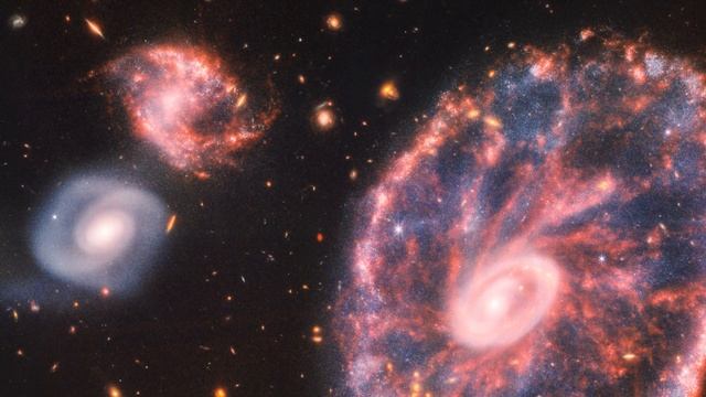 LOOK! Webb Captures Stellar Gymnastics in The Cartwheel Galaxy смотреть онлайн