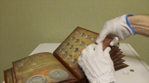 Альбом для монет в капсулах
