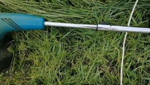 Распаковка - Триммер электрический Makita UR3000