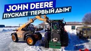 Установка мотора на John Deere 8335R после ремонта.