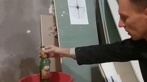 Стрельба из МР-654 по бутылке 0,7 Хортица