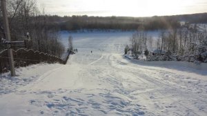 Катание с горки. База "Ситинка" на Рыбинском водохранилище