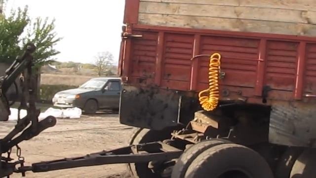 Трактор Т-150К и полуприцеп