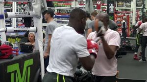 Roger Mayweather padwork with rising star Andrew Tabiti