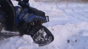 Polaris Sportsman 850 на гусеницах.MPG