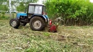 Расчистка заросших участков трактором с мульчером"Seppi".