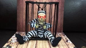 Игрушка скелет заключенный в клетке