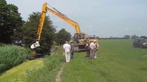 Очистка водоема от травы