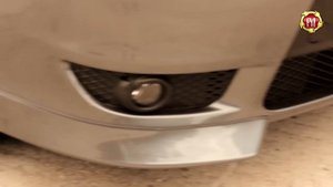 Накладки на передний бампер (клыки) для Mitsubishi Lancer X (2007-2010) (russ-artel.ru)