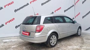 Opel Astra Универсал 1.8 AT (140 л. с.) Серебристый 2011 г.