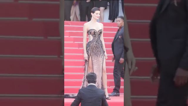 Model Isabeli Fontana poses on the steps of the Palais ahead of the Elvis world premiere