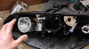 Тюнинг фар на BMW X5 e70 замена линз на светодиодные Bi Led и светодиодные ангельские глазки