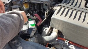 Replacing a 2006 Lexus RX400h battery, outside Costco.