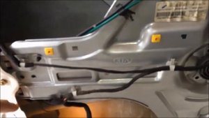 2004 Kia Spectra Door Panel and lock actuator removal