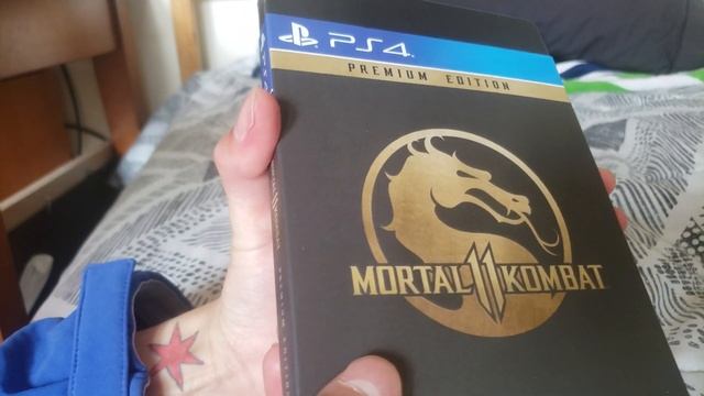 Mortal Kombat 11 Premium PS4 4k VideO unboxing. смотреть онлайн