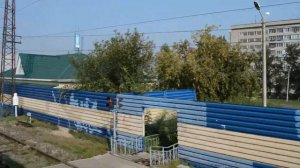 По мосту через Енисей в Красноярске на поезде №069