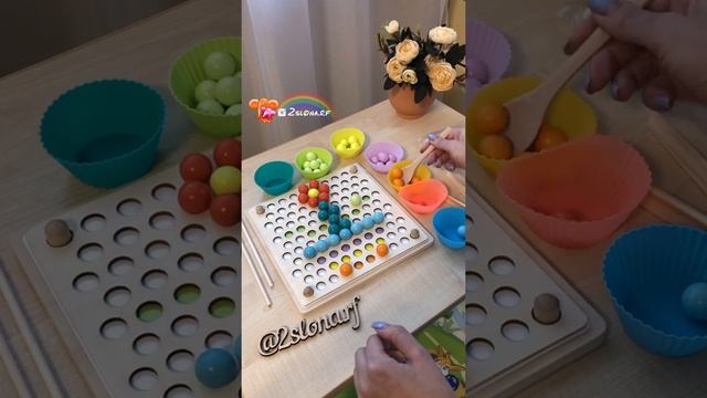 Монтессори игра с шариками