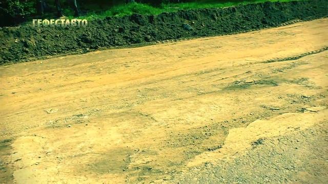 Отсыпка обочин дорог асфальтной крошкой.  Укатка укрепление  обочин.