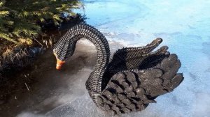 Лебеди из бумажной лозы.