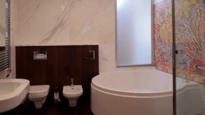 Угловая ванна в интерьере